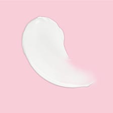 Weiße Creme auf rosa Hintergrund
