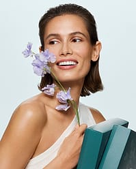 Woman with gifts and flower