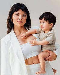 Mother holding toddler