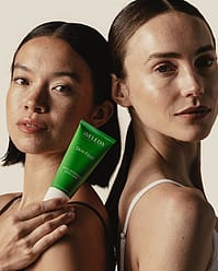 Woman holding Skin Food tube