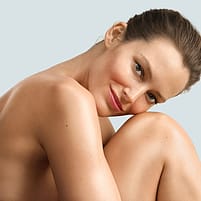 Woman and Revitalising Body Lotion - Blue Gentian benefits