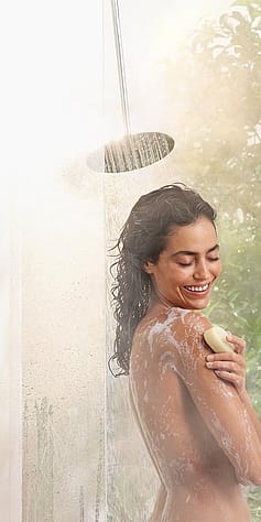 Woman smilin shower.