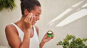 woman applying face cream