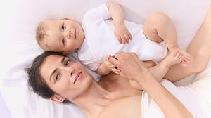mother and baby lying down