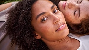 two women laying