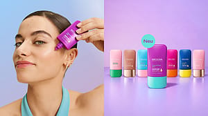 Frau hält Produkt vors Gesicht