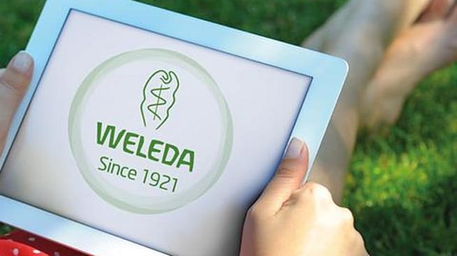 Ancien logo Weleda sur un iPad