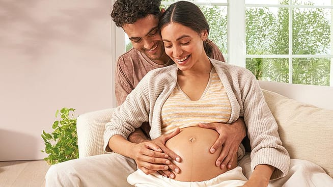 Schwangere Frau mit Partner