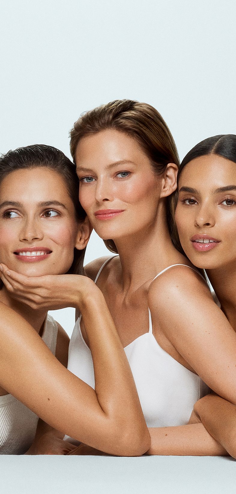 Drei lächelnde Frauen