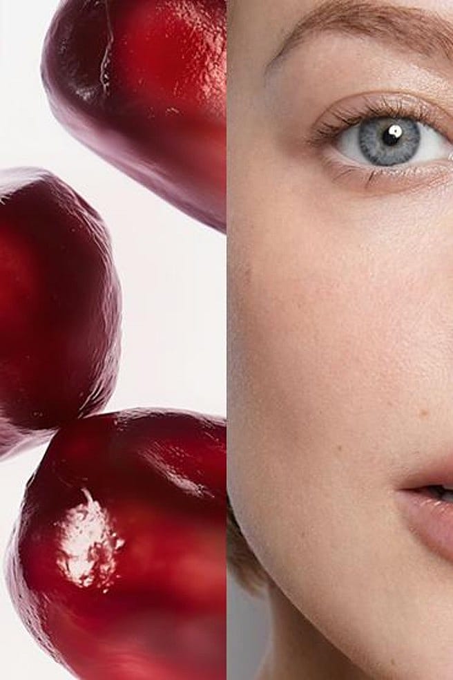 Granatapfel Kerne und Gesicht einer Frau