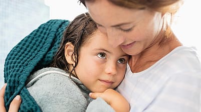 mother holding child