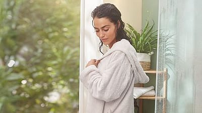 Woman in a bath robe.