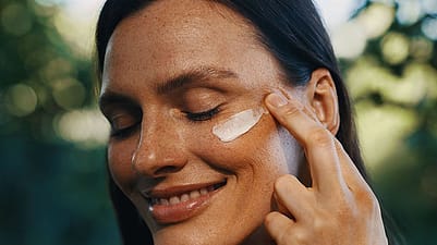 woman using day cream