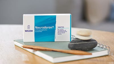 Eine Packung Weleda Tabletten auf einem Tisch