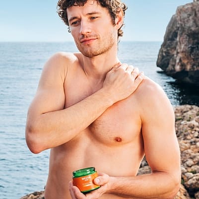 Man with Arnica Sport Massage Body Butter