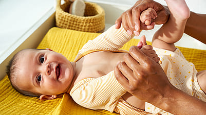 Mother and baby having fun