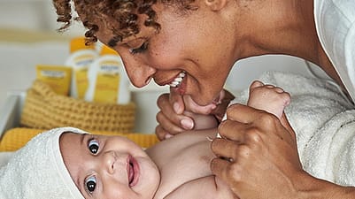 mother and baby having fun