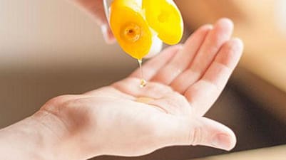 Baby oil in hand