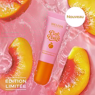 Baume lèvres teinté pink peach sur fond rose