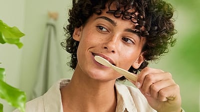Woman brushing her teeth