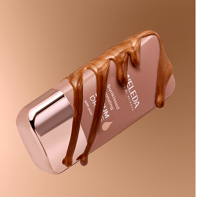 Model holds Product next to face