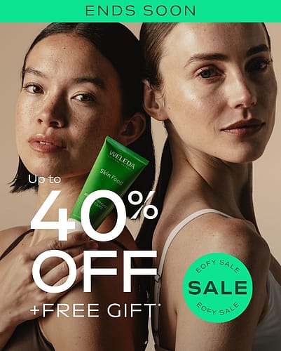 Two women back to back and one holding Weleda Skin Food Original and Up to 40% off * EOFY SALE + FREE Gift* text