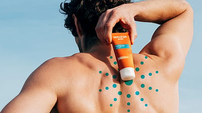 Man with Arnica Product