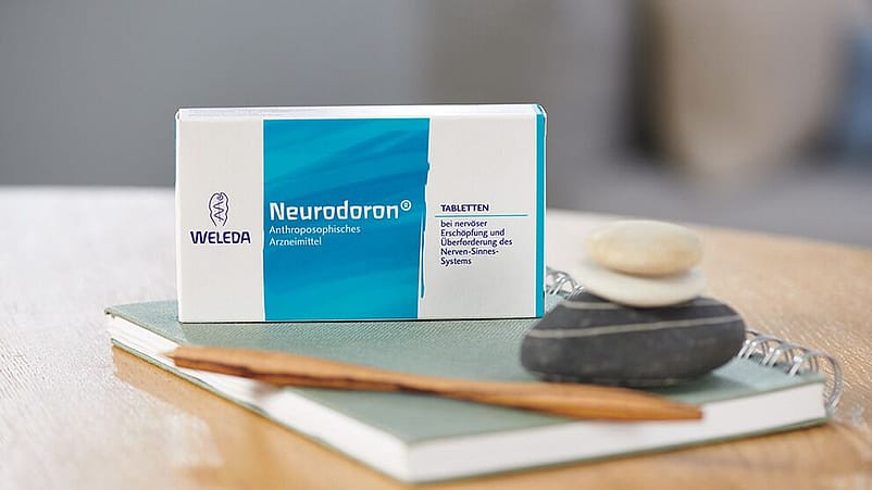 Eine Packung Weleda Tabletten auf einem Tisch