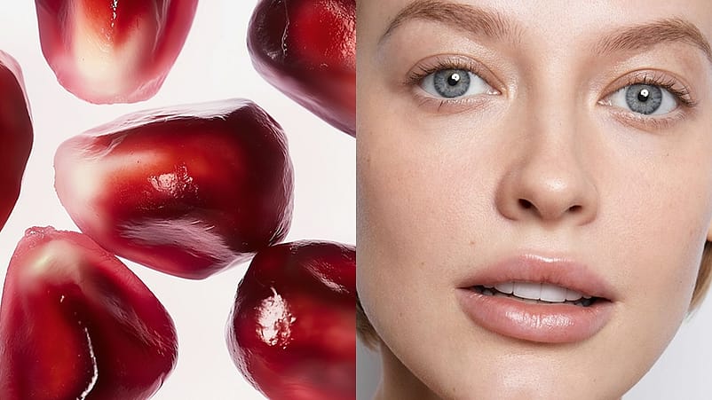 Granatapfelkerne und das Gesicht einer Frau