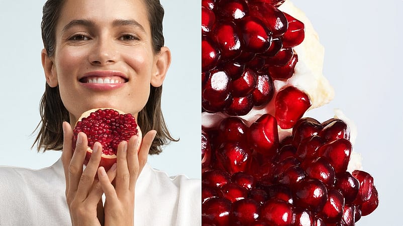 Frau mit Granatapfel