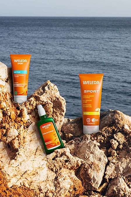 Weleda Arnica prodotti su uno scoglio vicino al mare
