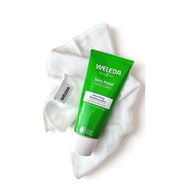 Skin Food Face tube placed on a white cloth.