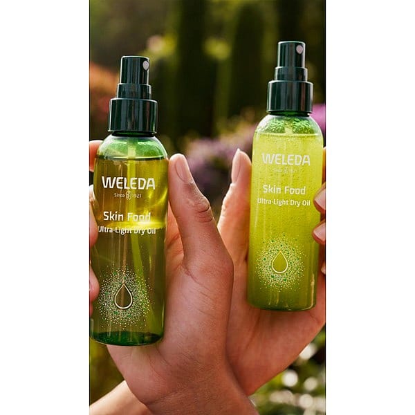 Two bottles of Skin Food Ultra-Light Dry Oil. One shaken and one still.