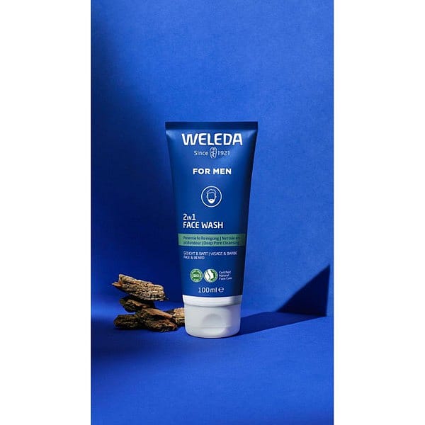 Men 2in1 Face Wash tube ona blue background with key ingredient willow bark.