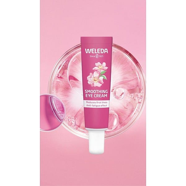 Smoothing Eye Cream Wild Rose & White Tea infront of a petri dish on a pink background.