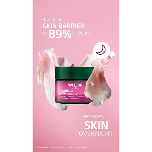 Smoothing Night Cream Wild Rose & White Tea surrounded by a wild rose petal with text benefits on a pink background.
