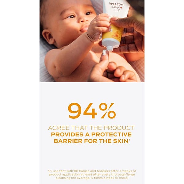 Dark skin baby lying donw and holding the Calendula nappy change cream fragrance free tube and mother adding to her finger.