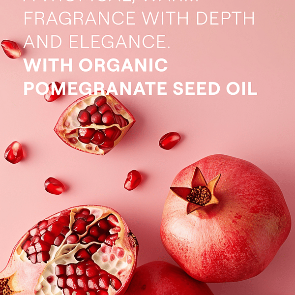 Inspire Body Wash ingredients text on pink background surrounded by pomegranate fruit.
