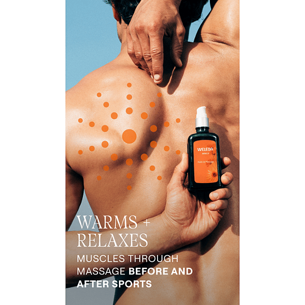 man is holding Arnica Sport Massage Oil behind his bare back with text.