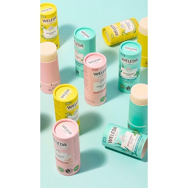 Deodorant Sticks group shot open tops against turquoise background.