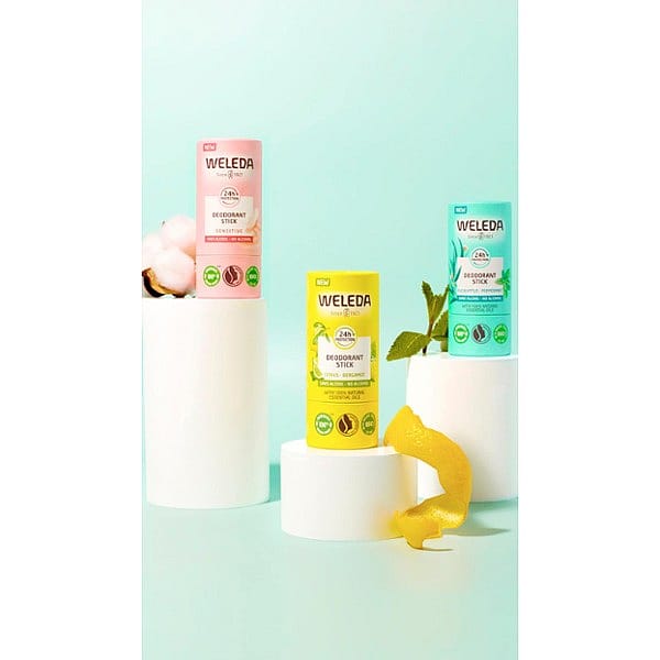 Natural Deodorant Sticks Sensitive, Citrus-Bergamot and eucalyptus-Peppermint on white plinths with cotton, lemon and mint next to each.